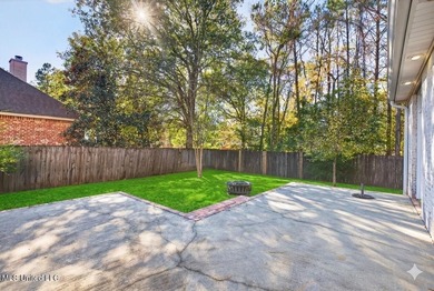 Welcome to 6516 Koula Drive, a peaceful retreat tucked away in on Diamondhead Country Club in Mississippi - for sale on GolfHomes.com, golf home, golf lot