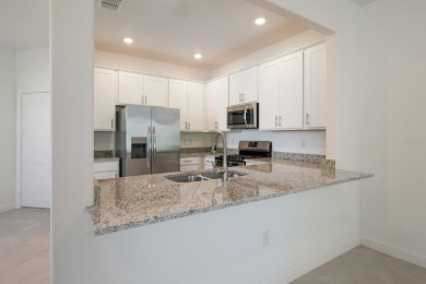 This brand new Townhome in Lorraine Lakes almost new. Very on Lakewood National Golf Club in Florida - for sale on GolfHomes.com, golf home, golf lot