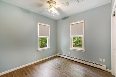 This updated 1930s cottage is full of charm and ready for you to on Laurel Links Country Club in New York - for sale on GolfHomes.com, golf home, golf lot