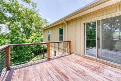 Welcome to your spacious retreat near Sugar Creek Golf Course! on Big Sugar Golf Club in Arkansas - for sale on GolfHomes.com, golf home, golf lot