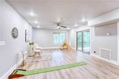Welcome to your spacious retreat near Sugar Creek Golf Course! on Big Sugar Golf Club in Arkansas - for sale on GolfHomes.com, golf home, golf lot