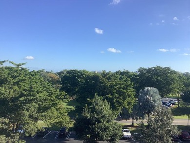 Lovely, bright and super well-maintained two bedroom two bath on Palm-Aire Country Club and Resort - The Oaks in Florida - for sale on GolfHomes.com, golf home, golf lot