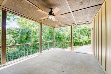 Welcome to your spacious retreat near Sugar Creek Golf Course! on Big Sugar Golf Club in Arkansas - for sale on GolfHomes.com, golf home, golf lot