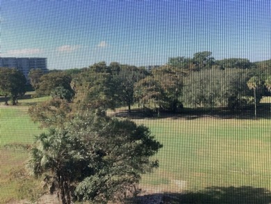 Lovely, bright and super well-maintained two bedroom two bath on Palm-Aire Country Club and Resort - The Oaks in Florida - for sale on GolfHomes.com, golf home, golf lot