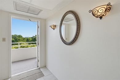 Lovely, bright and super well-maintained two bedroom two bath on Palm-Aire Country Club and Resort - The Oaks in Florida - for sale on GolfHomes.com, golf home, golf lot