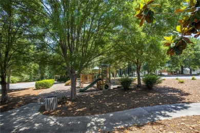 Experience golf course living at its finest in this spacious on Mirror Lake Golf Club in Georgia - for sale on GolfHomes.com, golf home, golf lot