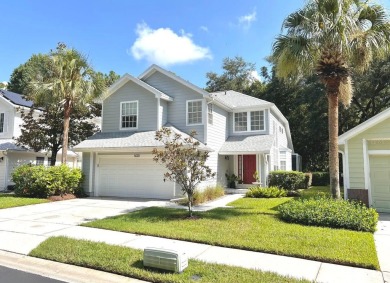 Nestled in the Maintenance Free Gated Village of Sterling Manor on Tampa Palms Golf and Country Club in Florida - for sale on GolfHomes.com, golf home, golf lot