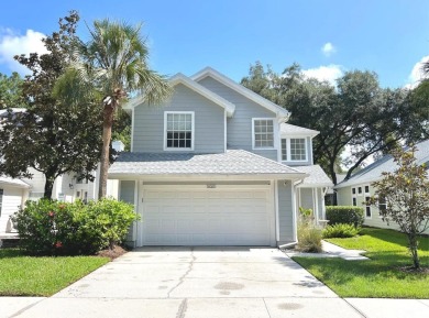 Nestled in the Maintenance Free Gated Village of Sterling Manor on Tampa Palms Golf and Country Club in Florida - for sale on GolfHomes.com, golf home, golf lot