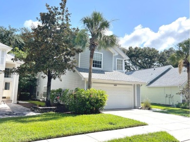 Nestled in the Maintenance Free Gated Village of Sterling Manor on Tampa Palms Golf and Country Club in Florida - for sale on GolfHomes.com, golf home, golf lot