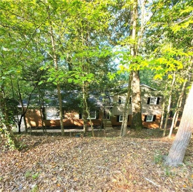 Welcome to this spacious 4-bedroom, 3-bathroom brick split-level on University of Georgia Golf Course in Georgia - for sale on GolfHomes.com, golf home, golf lot