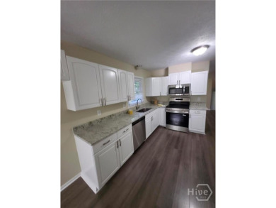 Welcome to this spacious 4-bedroom, 3-bathroom brick split-level on University of Georgia Golf Course in Georgia - for sale on GolfHomes.com, golf home, golf lot