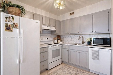 Great 2 bedrooms and 1.5 baths Condo with lake and golf view in on Flamingo Lakes Country Club in Florida - for sale on GolfHomes.com, golf home, golf lot