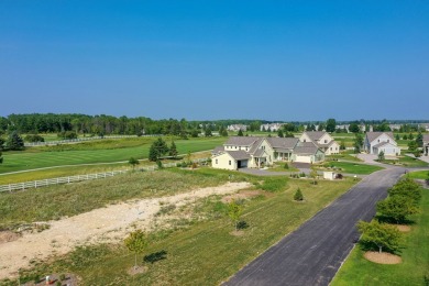 This Cobblestone Cottage is well underway and ready for June on Horseshoe Bay Golf Club in Wisconsin - for sale on GolfHomes.com, golf home, golf lot