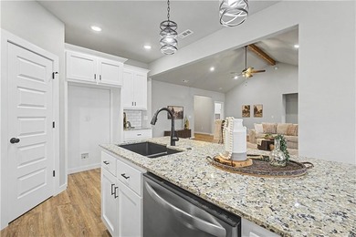 Experience modern living surrounded by nature! This brand-new on Bella Vista Country Club - Scottsdale in Arkansas - for sale on GolfHomes.com, golf home, golf lot