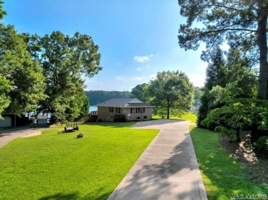 When you turn in to Fox Hollow and where the road ends on Myrick Hills Country Club in North Carolina - for sale on GolfHomes.com, golf home, golf lot