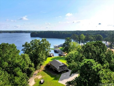 When you turn in to Fox Hollow and where the road ends on Myrick Hills Country Club in North Carolina - for sale on GolfHomes.com, golf home, golf lot