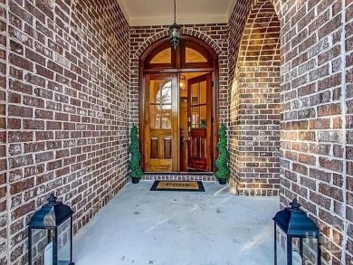 Luxurious All-Brick Home in Savannah Quarters. This remarkable on Savannah Quarters Country Club in Georgia - for sale on GolfHomes.com, golf home, golf lot