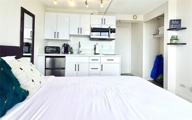 Stunning high floor one bedroom condo at Waikiki Hawaiian on Ala Wai Golf Course in Hawaii - for sale on GolfHomes.com, golf home, golf lot