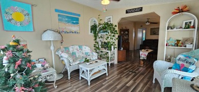 Florida fun and entertaining home with space for all your events on Zephyrhills Municipal Golf Course in Florida - for sale on GolfHomes.com, golf home, golf lot
