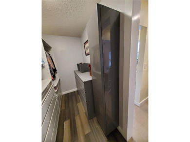 WELCOME TO THIS WARM AND INVITING, NO HOA FEE, SOLAR HOME, where on Sandpiper Golf Club in Florida - for sale on GolfHomes.com, golf home, golf lot