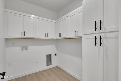 Welcome home to this stylish 4-bedroom, 3-bath residence on Emerald Springs Golf Course in Texas - for sale on GolfHomes.com, golf home, golf lot