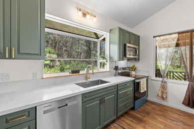 Watch Video: Enjoy the cool refreshing rainforest environment on Volcano Golf and Country Club in Hawaii - for sale on GolfHomes.com, golf home, golf lot