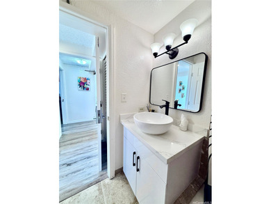 Stunning high floor one bedroom condo at Waikiki Hawaiian on Ala Wai Golf Course in Hawaii - for sale on GolfHomes.com, golf home, golf lot