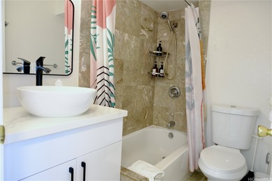 Stunning high floor one bedroom condo at Waikiki Hawaiian on Ala Wai Golf Course in Hawaii - for sale on GolfHomes.com, golf home, golf lot