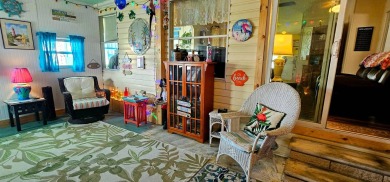 Florida fun and entertaining home with space for all your events on Zephyrhills Municipal Golf Course in Florida - for sale on GolfHomes.com, golf home, golf lot