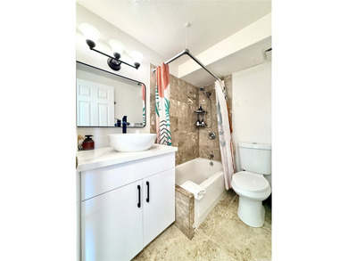 Stunning high floor one bedroom condo at Waikiki Hawaiian on Ala Wai Golf Course in Hawaii - for sale on GolfHomes.com, golf home, golf lot