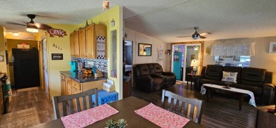 Florida fun and entertaining home with space for all your events on Zephyrhills Municipal Golf Course in Florida - for sale on GolfHomes.com, golf home, golf lot