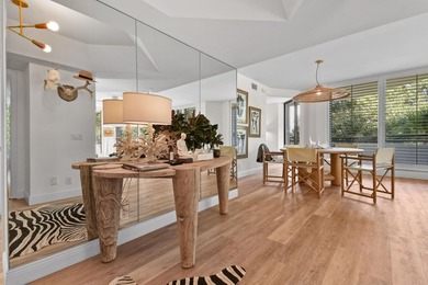 Step into this exquisitely reimagined condo in the prestigious on Jonathans Landing Golf Club in Florida - for sale on GolfHomes.com, golf home, golf lot