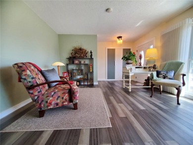WELCOME TO THIS WARM AND INVITING, NO HOA FEE, SOLAR HOME, where on Sandpiper Golf Club in Florida - for sale on GolfHomes.com, golf home, golf lot