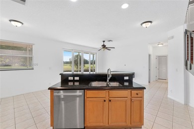 Beautifully maintained 4/3 bath golf course residence in a on Palm-Aire Country Club and Resort - The Oaks in Florida - for sale on GolfHomes.com, golf home, golf lot