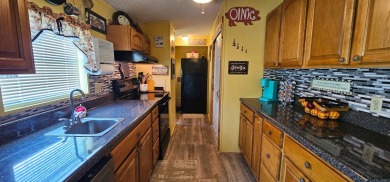 Florida fun and entertaining home with space for all your events on Zephyrhills Municipal Golf Course in Florida - for sale on GolfHomes.com, golf home, golf lot
