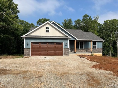 Welcome to this beautiful new construction home in the desirable on Terre Du Lac Golf and Country Club in Missouri - for sale on GolfHomes.com, golf home, golf lot