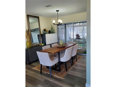 WELCOME TO THIS WARM AND INVITING, NO HOA FEE, SOLAR HOME, where on Sandpiper Golf Club in Florida - for sale on GolfHomes.com, golf home, golf lot