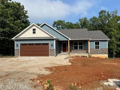 Welcome to this beautiful new construction home in the desirable on Terre Du Lac Golf and Country Club in Missouri - for sale on GolfHomes.com, golf home, golf lot