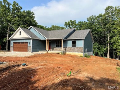 Welcome to this beautiful new construction home in the desirable on Terre Du Lac Golf and Country Club in Missouri - for sale on GolfHomes.com, golf home, golf lot