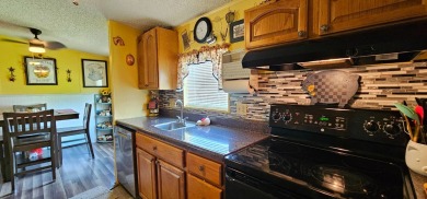 Florida fun and entertaining home with space for all your events on Zephyrhills Municipal Golf Course in Florida - for sale on GolfHomes.com, golf home, golf lot