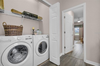 Welcome to this beautifully updated end-unit townhome, perfectly on Wedgefield Golf Club in Florida - for sale on GolfHomes.com, golf home, golf lot