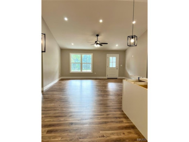 Welcome to this beautiful new construction home in the desirable on Terre Du Lac Golf and Country Club in Missouri - for sale on GolfHomes.com, golf home, golf lot