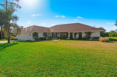 This exquisite single-family home is situated in the highly on Imperial Golf Club in Florida - for sale on GolfHomes.com, golf home, golf lot