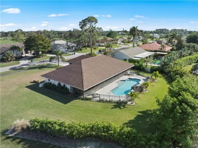 This exquisite single-family home is situated in the highly on Imperial Golf Club in Florida - for sale on GolfHomes.com, golf home, golf lot