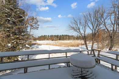 This charming 1.5-story home offers water access to Lake Iola on Glacier Wood Golf Club in Wisconsin - for sale on GolfHomes.com, golf home, golf lot