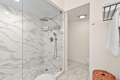 Step into this exquisitely reimagined condo in the prestigious on Jonathans Landing Golf Club in Florida - for sale on GolfHomes.com, golf home, golf lot