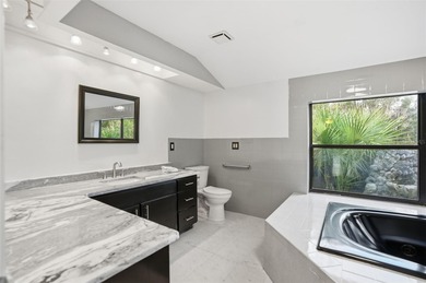 One or more photo(s) has been virtually staged. Beautiful Custom on Brooksville Country Club At Majestic Oaks in Florida - for sale on GolfHomes.com, golf home, golf lot