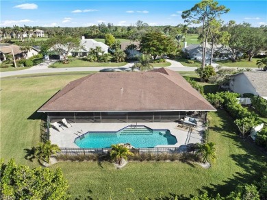 This exquisite single-family home is situated in the highly on Imperial Golf Club in Florida - for sale on GolfHomes.com, golf home, golf lot