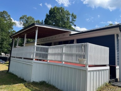 MOVE-IN READY, FURNISHED PROPERTY FOR LESS THAN $100K.  This on River Ridge Golf Club in Virginia - for sale on GolfHomes.com, golf home, golf lot