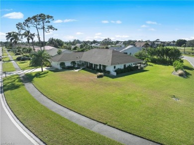 This exquisite single-family home is situated in the highly on Imperial Golf Club in Florida - for sale on GolfHomes.com, golf home, golf lot